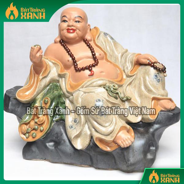 Tượng sứ Di lặc ngồi bệ đá men rạn cao 60cm rộng 70cm Tượng sứ Di lặc ngồi bệ đá men rạn cao 60cm rộng 70cm